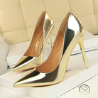 Pair of fashionable gold stiletto heels in langry style