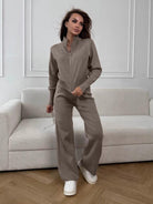 Langry fashion beige zip-up jumpsuit with white sneakers, minimalist ملابس design