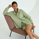 Woman in light green Casual Winter Pajamas displaying comfortable langry fashion attire