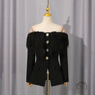 Elegant black feathered blazer with gold buttons in langry fashion