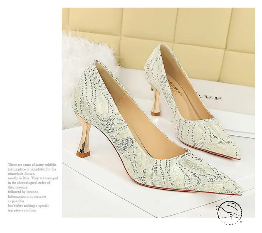 Langry fashion white snakeskin mid heel pumps with gold accents