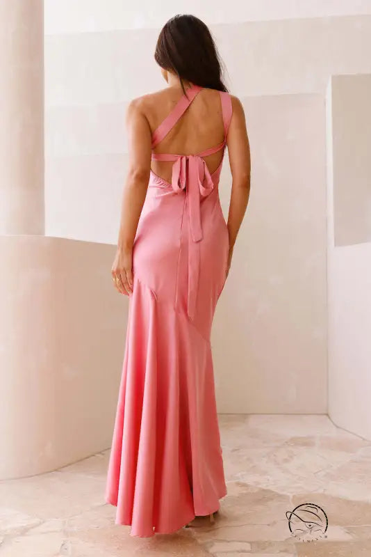 Elegant slim fit fishtail dress in coral pink with halter tie-back