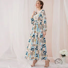 Woman in floral print slim fit fresh maxi dress with patchwork patterns