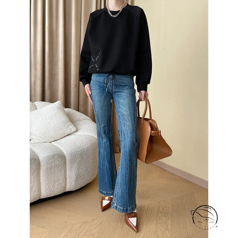 Black long-sleeved casual embroidery sweatshirt with white cross-stitch on chest