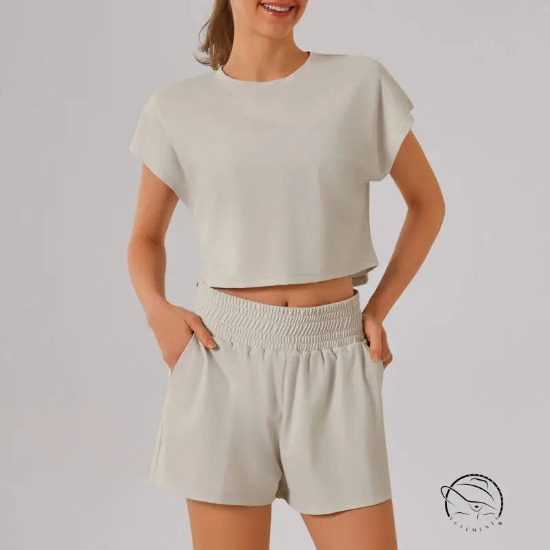 Beige loose sports yoga fitness set with cropped t-shirt and shorts