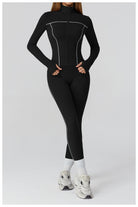 Langry black and white athletic jumpsuit with silver accents for fashion fitness
