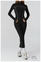 Langry black and white athletic jumpsuit with silver accents for fitness fashion