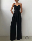 Elegant black modern jumpsuit with wide-leg, spaghetti straps, and sweetheart neckline