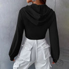 Slim short faux long-sleeved cropped hoodie with white cargo pants in trendy fashion