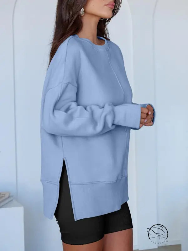 Light blue langry fashion pullover with high-low hem and zipper detail