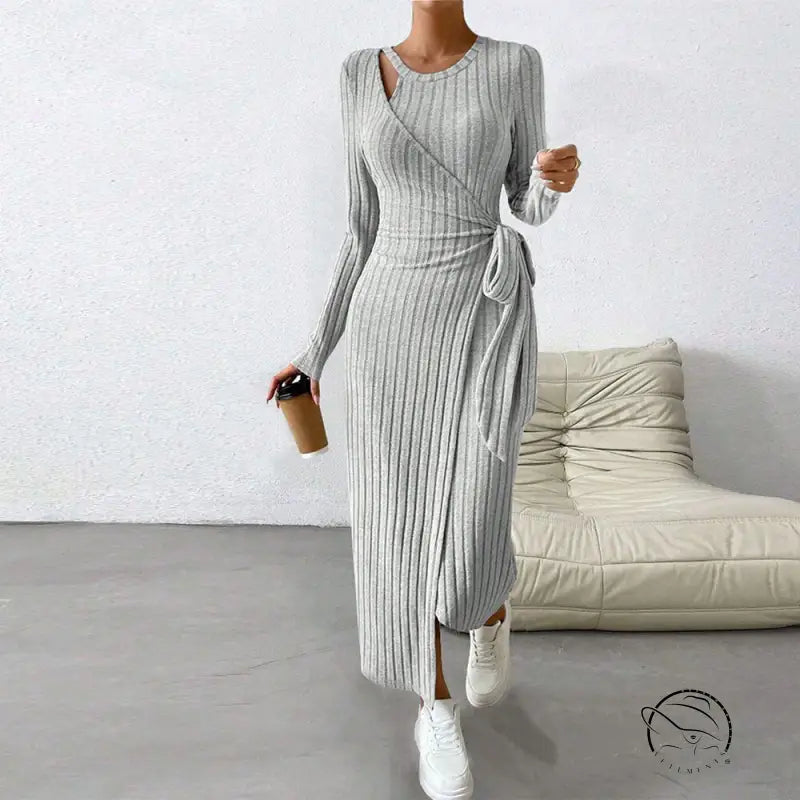 Warm knitted gray maxi dress with long sleeves and side slit