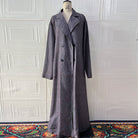 Charcoal gray houndstooth double-breasted trench coat with notched lapels