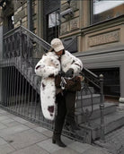 Cozy faux fur long coat in white black speckled fur fashion