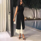 Langry fashion black and white sleeveless jumpsuit with side slit and open back