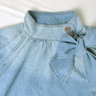 Light blue denim blouse with bow for stylish langry fashion and ملابس enthusiasts
