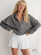 Cozy loose hooded sweatshirt in gray half-zip with white shorts, langry fashion ملابس