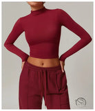 Burgundy long-sleeve mock neck crop top in quick drying fitness sports outerwear