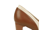 Fashionable Super High Heel: brown leather pump with white sole and stacked design