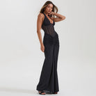Langry black ruched fashion jumpsuit with halter neckline and flared legs