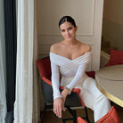 Elegant white off-the-shoulder langry fashion jumpsuit with cross pleats