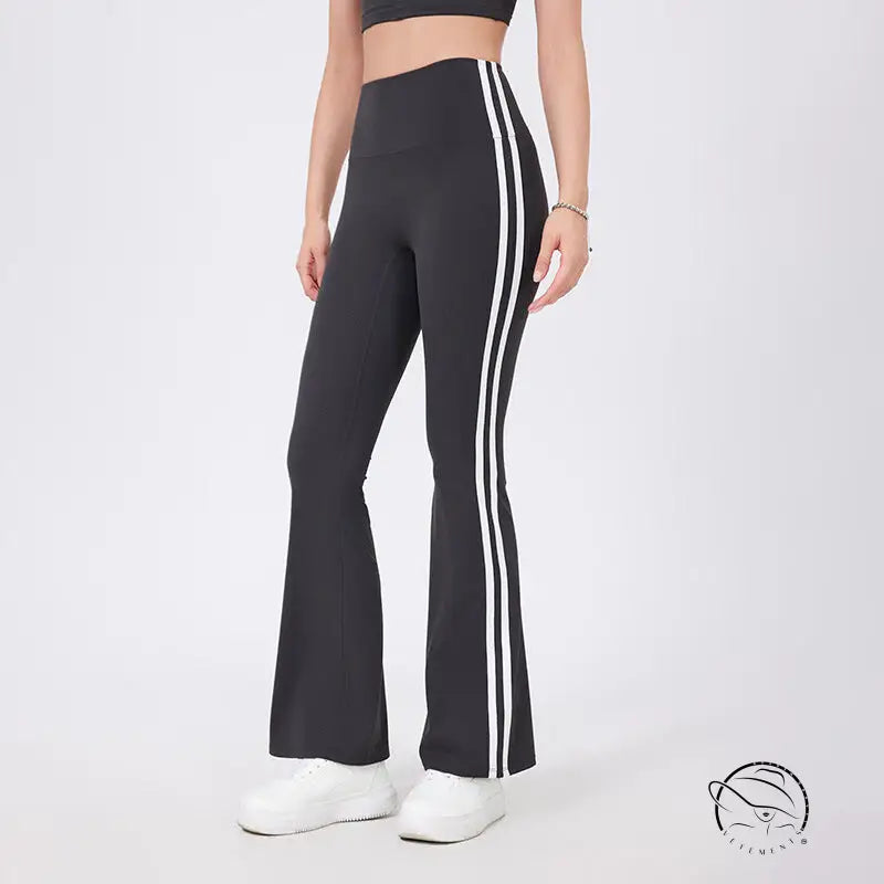 Black high-waist yoga pants with white stripes, peach hip raise flared design