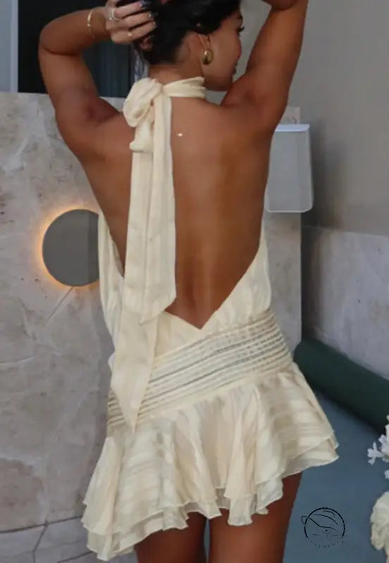 Stunning backless mini dress with halter style