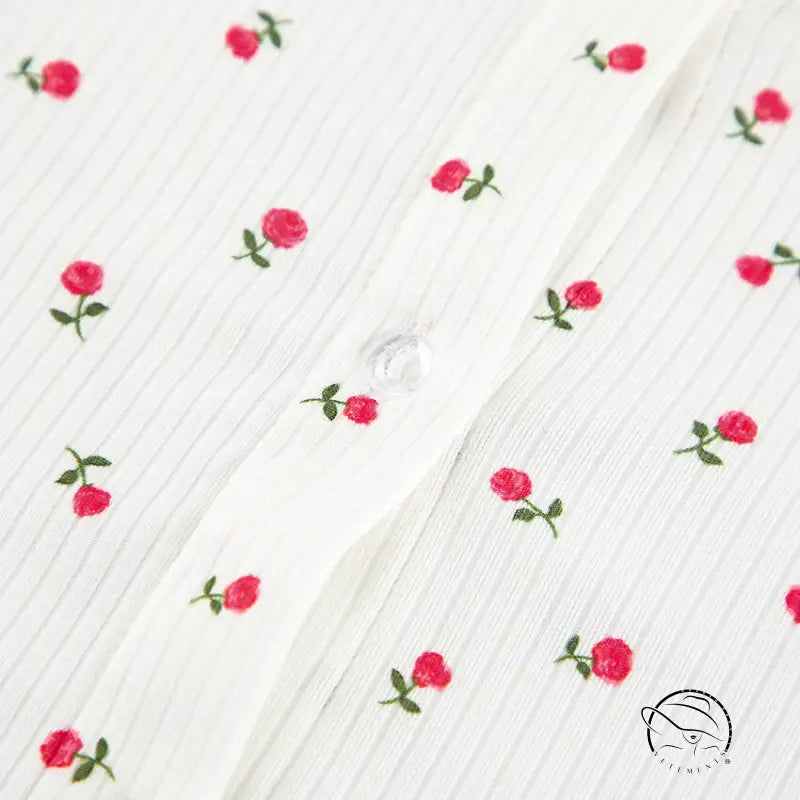 White ribbed langry cardigan with red rose embroidery and button closure