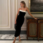 Strapless black dress with white trim, a stunning fashion choice for any occasion