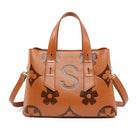 Langry fashion cognac Louis Vuitton satchel with floral bow
