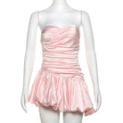 Pink strapless bubble dress with ruched bodice, perfect for summer fashion ملابس