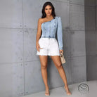 Women slim denim top with light-wash one-shoulder puff sleeve and white distressed shorts