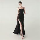 Elegant langry black satin slip dress with high slit and spaghetti straps