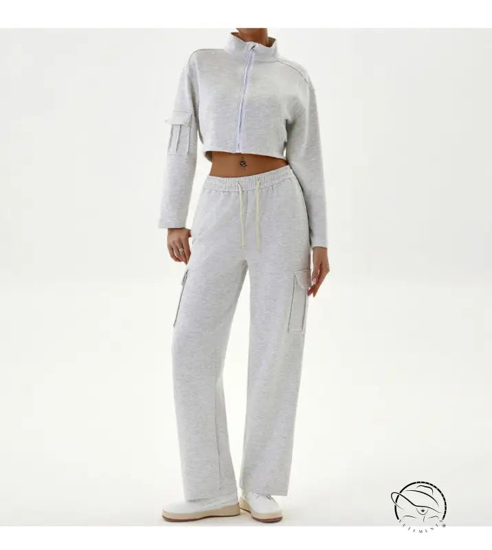 Woman in gray cropped jacket and cargo pants, winter workwear casual sports set