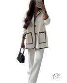 Cream-colored tweed blazer with black scalloped trim in camel suit set