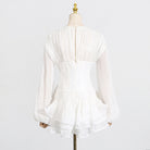 Elegant white ruffled blouse in Langry fashion, long sleeves, gathered bodice