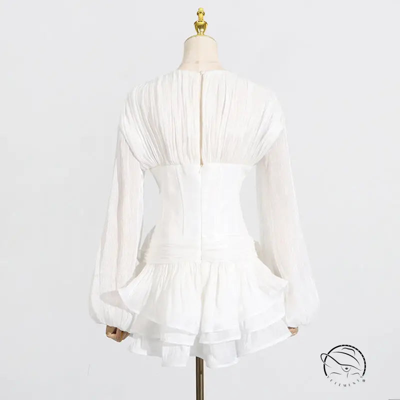 Elegant white ruffled langry blouse in fashion ملابس style