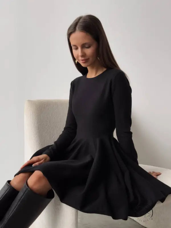 Beautiful woolen knitted black long-sleeved dress
