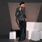 Elegant long sleeve black gown with silver embellishments for stylish evening wear
