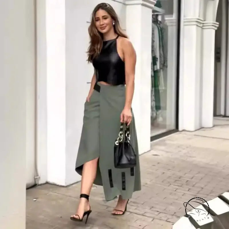 Woman in elegant sleeveless halter short top skirt set