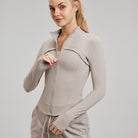Beige athletic zip-up jacket from Winter Fleece-lined Yoga Jacket collection, stylish ملابس for fitness and fashion