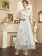Elegant light blue langry fashion dress with silver floral embroidery