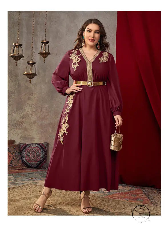 Maroon long-sleeved A-line dress with gold embroidery and belt