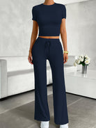 Navy blue short-sleeved crop top and wide-leg pants yoga fashion set