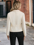 Cream-colored tailored blazer with belted waist in Langry fashion