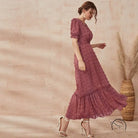 Flowing mauve short sleeve Langry midi dress with dotted pattern and ruffled hem