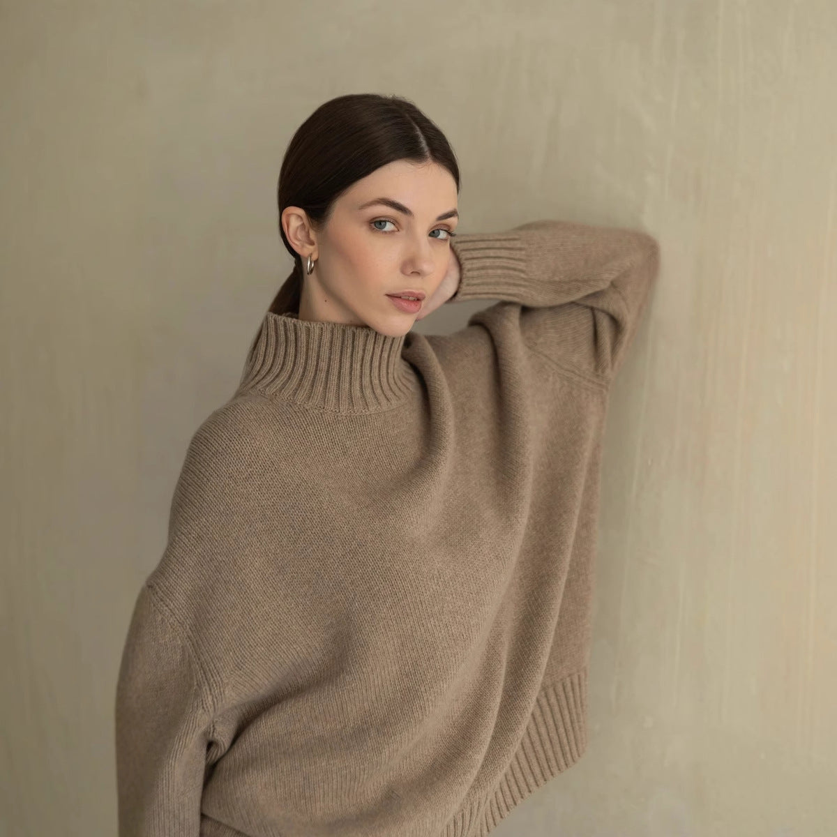 Beige oversized langry fashion turtleneck sweater with ribbed detailing