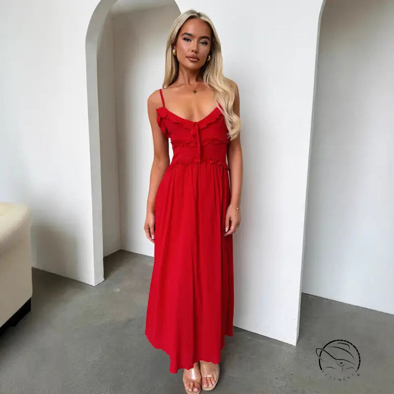 Elegant loose dress: red spaghetti-strap maxi with fitted bodice and flowing skirt