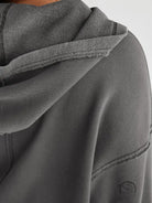 Cozy loose hooded sweatshirt in gray with langry fabric texture and seams