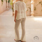 White beach loose shirt and casual trousers crochet set