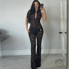 Langry black lace jumpsuit with flared legs and deep neckline